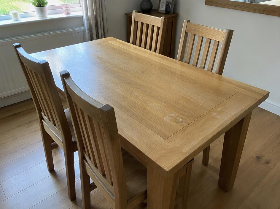 Solid oak dining table + 4 chairs